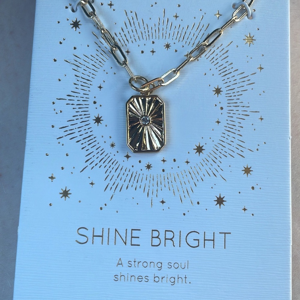 Gold Toned Pendant Necklace with Starburst Design